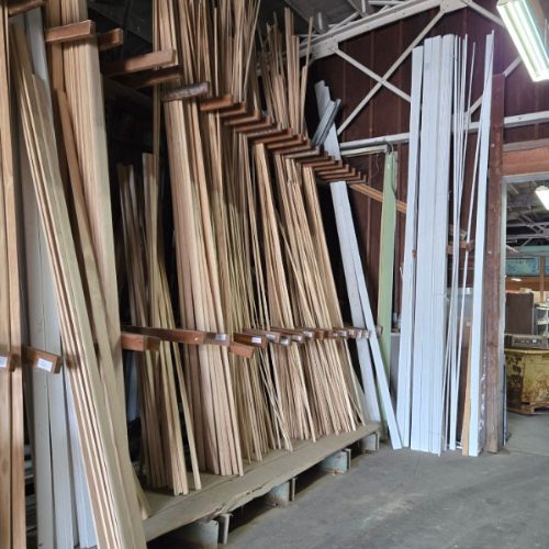 Lumber and moulding outside of Salem Lumber and Feed.