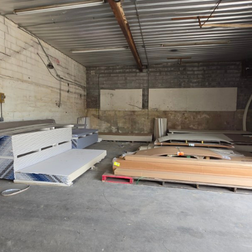 Lumber and drywall outside of Salem Lumber and Feed.