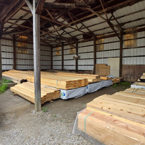 Lumber and supplies on display outside of Salem Lumber.