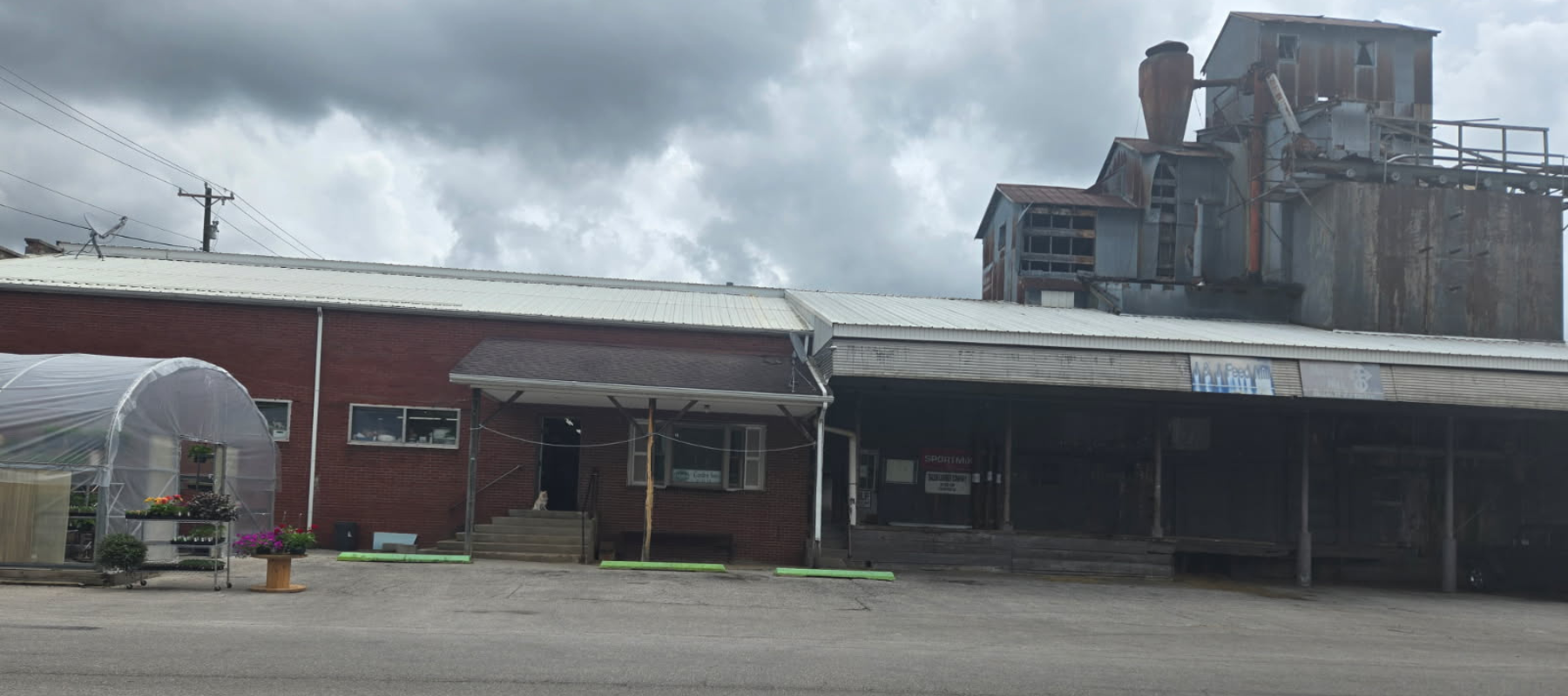 Salem Lumber & Feed store front on a cloudy day.